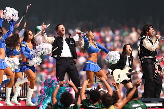 The Jonas Brothers perform at halftime of the NFL football game between the Los Angeles Rams and San Francisco 49ers at the Melbourne Cricket Ground on September 11, 2026 in Melbourne, Australia.
