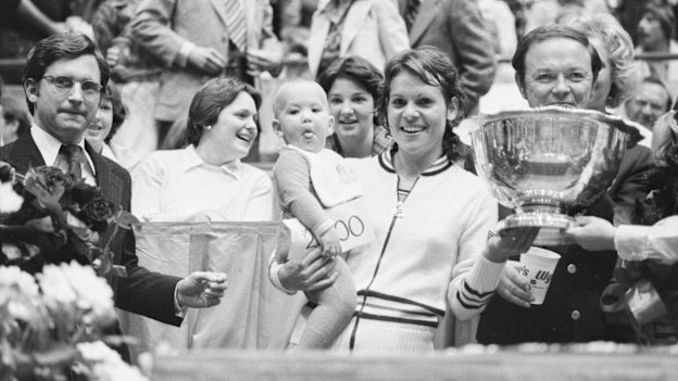 Evonne Goolagong Cawley holds daughter Kelly after winning a tournament in 1978. 