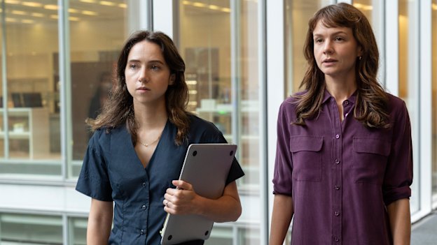 Zoe Kazan as Jodi Kantor, left, and Carey Mulligan as Megan Twohey in a scene from She Said. The film has prompted discussion in the local industry about the connection between Harvey Weinstein and a major local poducer.