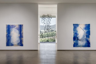 Installation view, 'Looking Glass: Judy Watson and Yhonnie Scarce', TarraWarra Museum of Art. Left to right, Judy Watson, standing stone with spines 2020; Yhonnie Scarce, Cloud Chamber 2020 (detail); Judy Watson, standing stone, grevillea 2020.
