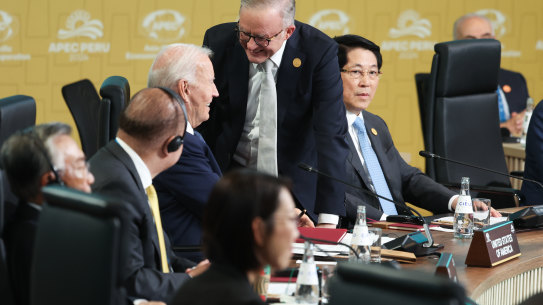 Prime Minister Anthony Albanese greets US President Joe Biden at the APEC summit in Peru.