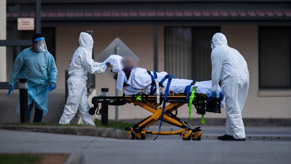 A resident is removed from St Basil’s in July 2020.