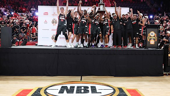 The Illawarra Hawks celebrate their NBL title triumph a fortnight ago.