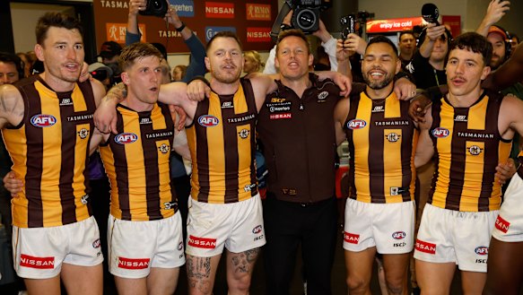 Josh Battle, Dylan Moore, Blake Hardwick, Sam Mitchell, Jarman Impey and Massimo D’Ambrosio belt out the song after eliminating the Giants on enemy soil.
