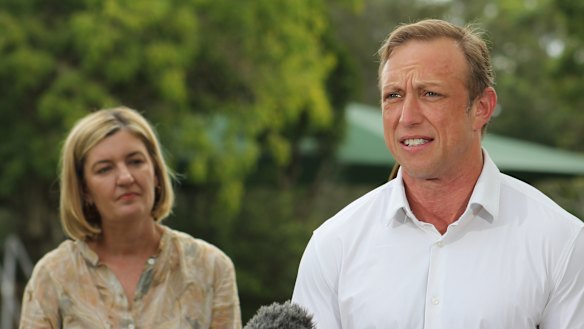 Steven Miles speaks to the media outside Parliament House, alongside shadow treasurer Shannon Fentiman.

