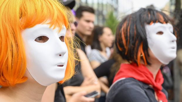 People gather to protest in support of women during a nationwide women's strike in Zurich, Switzerland. 