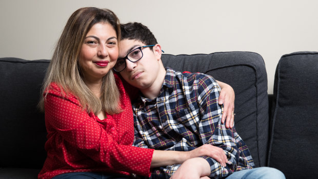 Ferah Aad with her son, Patrick, who has an illness with no diagnosis, in their Sydney home.