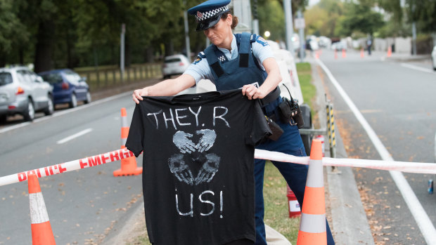 Police gaurd the road near the Al Noor Mosque on Wednesday.