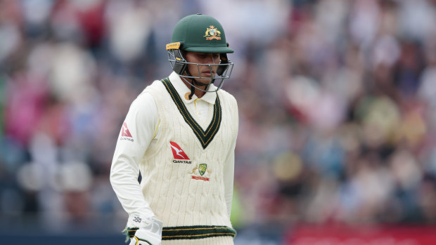 Usman Khawaja was caught down the leg-side for eight off the bowling of Stuart Broad.