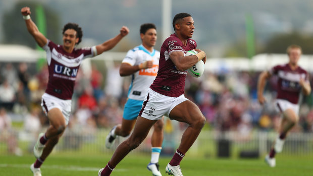 Jason Saab runs away for another easy score for the Sea Eagles. 