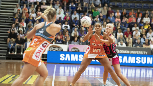 Giants wing defence Kristiana Manu'a and Thunderbirds Charlee Hodges. 