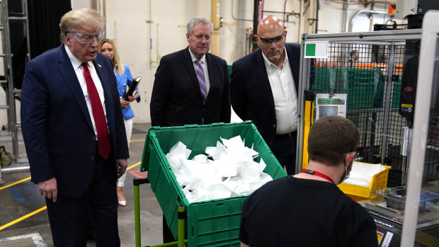 President Donald Trump tours an N95 mask manufacturing plant in Phoenix, Arizona.