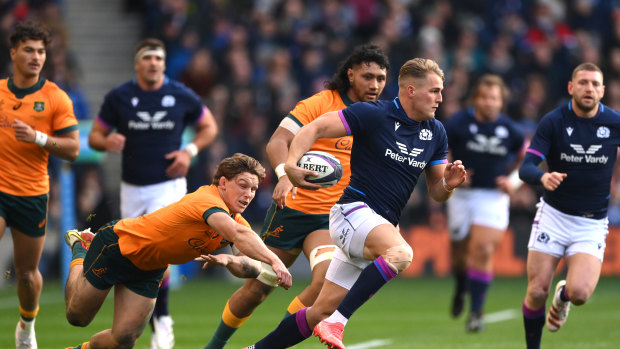 Duhan van der Merwe makes a break for Scotland. 