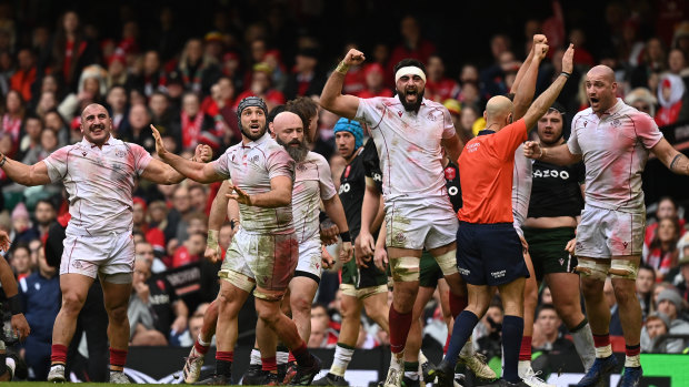 Georgia celebrate their one-point win over Wales last week. 