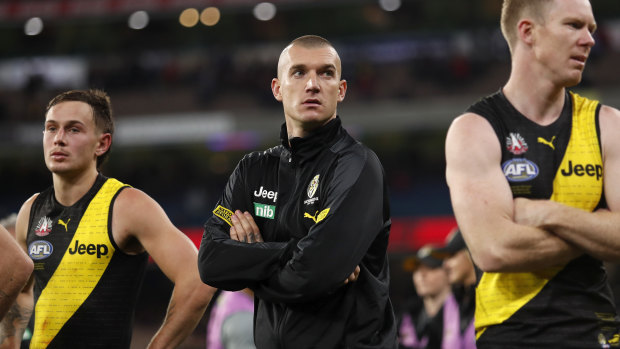 Dustin Martin suffered a concussion during the Tigers’ loss to Melbourne on Saturday and will miss this weekend’s game.