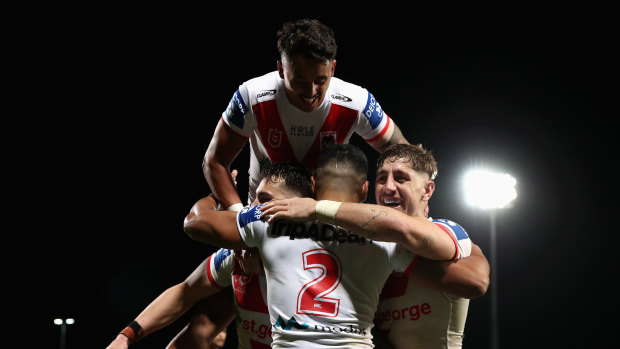 Mathew Feagai of the Dragons celebrates scoring a try late in the game.