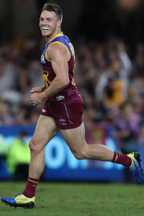 Lincoln McCarthy celebrates a goal in the Lions’ clash with Essendon.