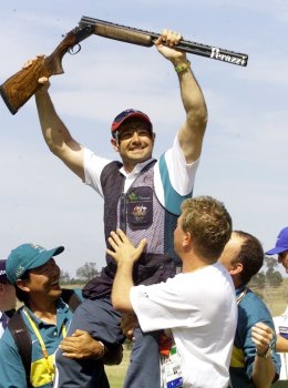 Australian shooter Michael Diamond celebrates after winning the gold medal in the Men's Trap Final at the Sydney International Shooting Center,  Sunday, Sept.  17, 2000.