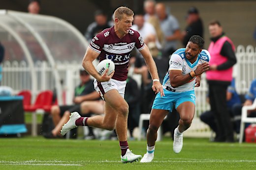 Tom Trbojevic bursts into the clear on the way to scoring a try against the Titans in Mudgee on Saturday.