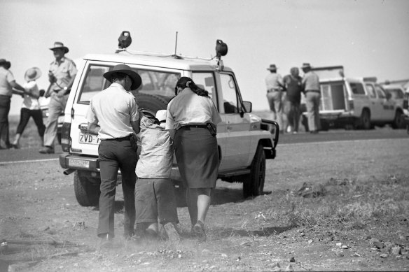 Police arrest protesters that had broken through into the defence facility.