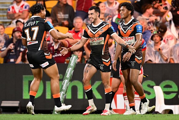 Charlie Staines celebrates a try against the Dragons.