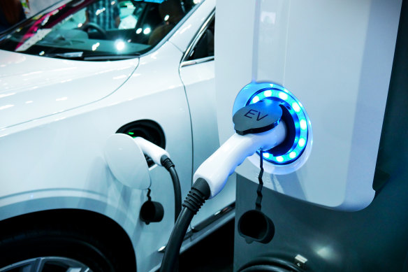 The Coalition is arguing that take-up of electric cars would improve if the money reserved for tax cuts was invested in more charging stations.