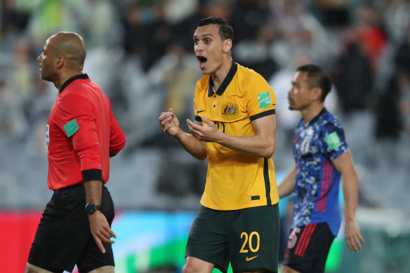 Socceroo Trent Sainsbury remonstrates with referee Nawaf Abdullah Shukrallah during Australia’s loss to Japan in Sydney.