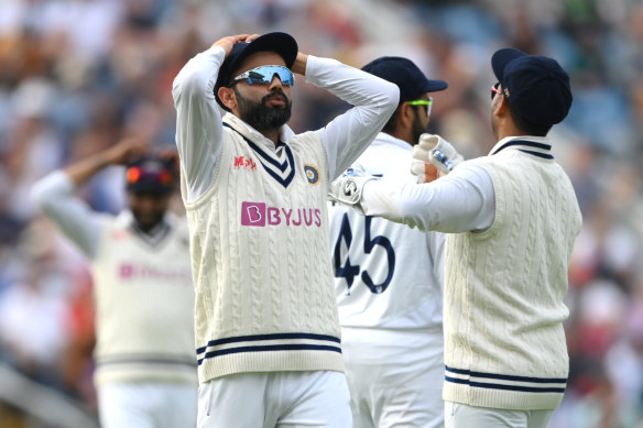Kohli and the slips cordon react to a near-miss on day one.