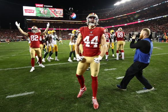 49ers players celebrate after winning the NFC championship and qualifying for the Super Bowl.