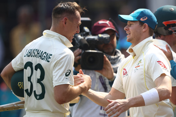 All smiles: Marnus Labuschagne is congratulated by Steve Smith.