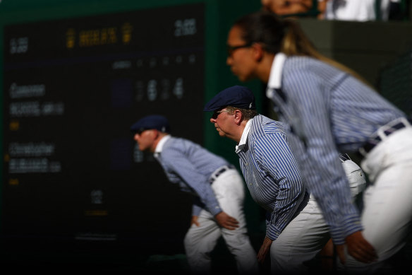 Line judges look on during day five of The Championships Wimbledon 