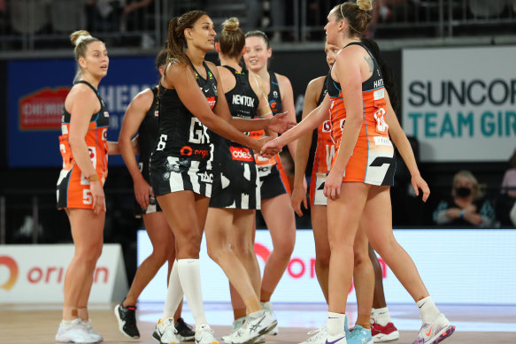 Geva Mentor of the Magpies and the Giants’ Jo Harten after Sunday’s clash.