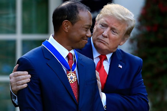 Trump awarding Tiger Woods the Presidential Medal of Freedom in 2019.