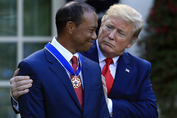 Trump awarding Tiger Woods the Presidential Medal of Freedom in 2019.
