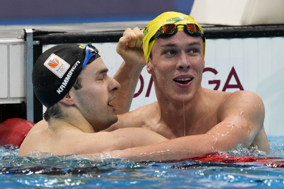 Zac Stubblety-Cook celebrates after winning the men’s 200m breaststroke final with Arno Kamminga, of the Netherlands