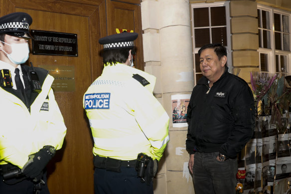 Kyaw Zwar Minn, locked out of the Myanmar embassy, talks to London police.