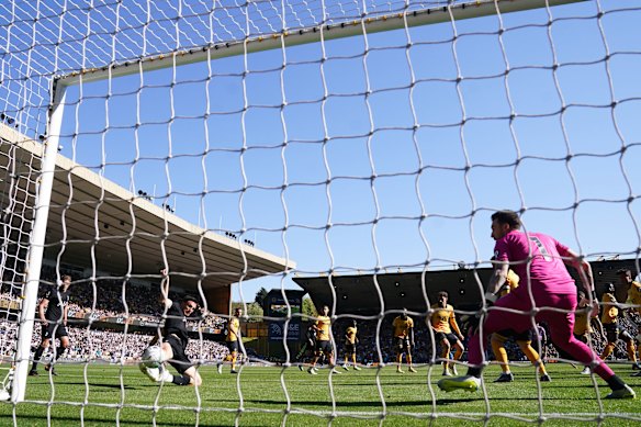 Tottenham’s Joao Palhinha scores against Wolves.