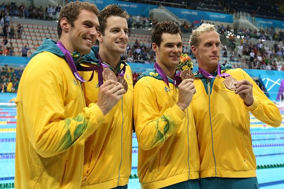 Matt Targett, James Magnussen, 
Christian Sprenger and Hayden Stoeckel pose with their bronze medals in London eight years ago.