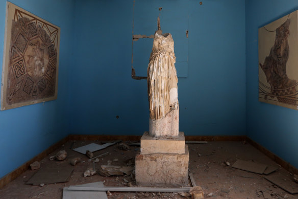 A beheaded and mutilated statue in a Palmyra museum.