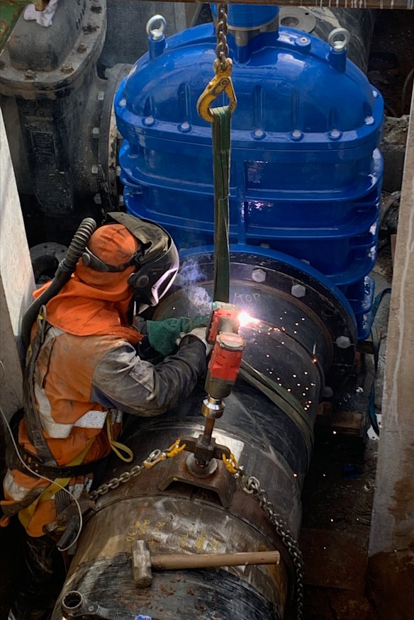 Crews work to repair a damaged sewerage main which caused a major spill in Spearwood.