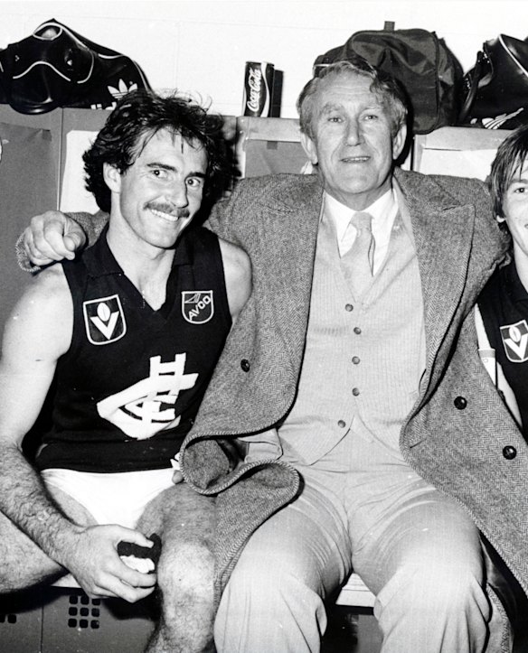 Ken Hunter is congratulated by Prime Minister Malcolm Fraser after winning the 1982 grand final.