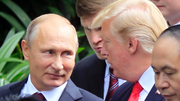 Russian President Vladimir Putin, left, and Donald Trump in Vietnam last year.