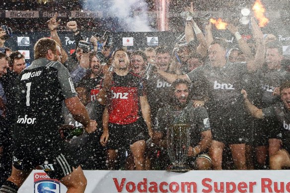 Champions: The Crusaders celebrate their Super Rugby final win against the Lions at Ellis Park.