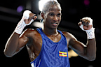 Nuhu Batte of Team Uganda celebrates a win in Glasgow.
