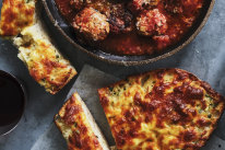 The cheesy garlic bread goes perfectly with meatballs “al forno” (pictured).