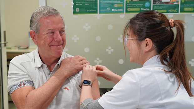 Queensland Health Minister Tim Nicholls received his flu vaccination on Tuesday before announcing an expansion of the state’s needle-free flu mist program. 