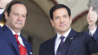 Marco Rubio, right, waves after being welcomed by Panama’s Foreign Minister Javier Martinez-Acha upon his arrival at the presidential palace in Panama City.
