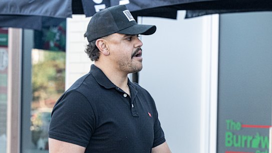 Latrell Mitchell arrives at South Sydney headquarters on Tuesday morning.