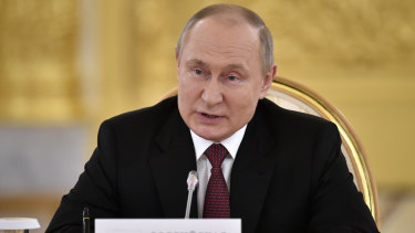 Russian President Vladimir Putin addresses a meeting at the Kremlin on Monday.