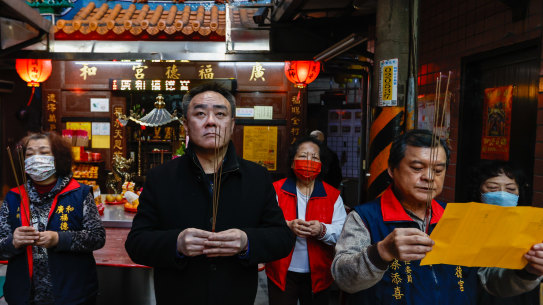 Liang Hsu-wei prays at his temple in Taipei